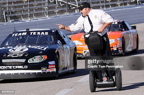 Actor and comedian Kevin James races NASCAR stock cars with his Segway to promote the release of his new movie "Paul Blart: Mall Cop" at Texas Motor...