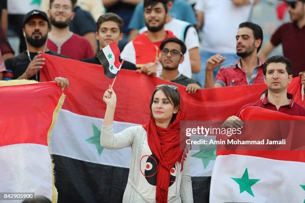 Fans of Syria show their support during FIFA 2018 World Cup Qualifier match between Iran and Syria on September 5, 2017 in Tehran, Iran.