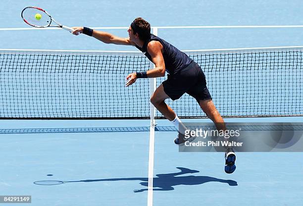 Juan Martin Del Potro of Argentina plays a backhand to Viktor Troicki or Serbia during day four of the Heineken Open at ASB Tennis Centre on January...