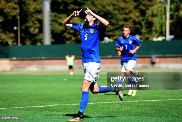 Alessandro Bastoni of Italy U19 celebrates after scoring the 1-1 goal during the match between Italy U19 and Russia U19 at Stadio Mirabello on...