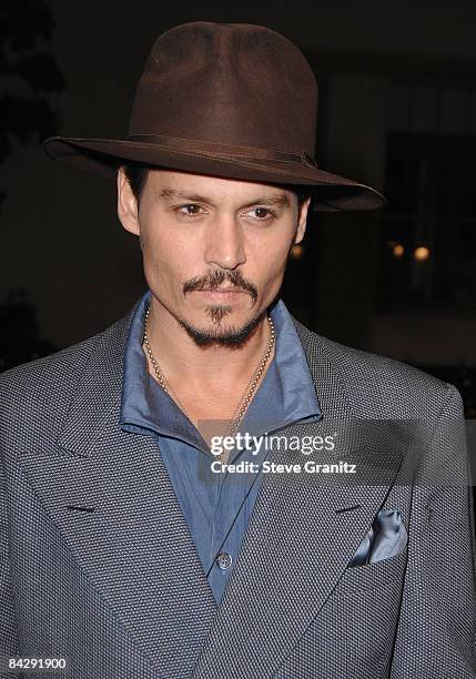 Actor Johnny Depp arrives at a special screening for DreamWorks Pictures' 'Sweeney Todd' at the Paramount Theater on December 5, 2007 in Los Angeles,...