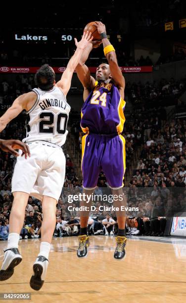 Kobe Bryant of the Los Angeles Lakers shoots against Manu Ginobili of the San Antonio Spurs on January 14, 2009 at the AT&T Center in San Antonio,...