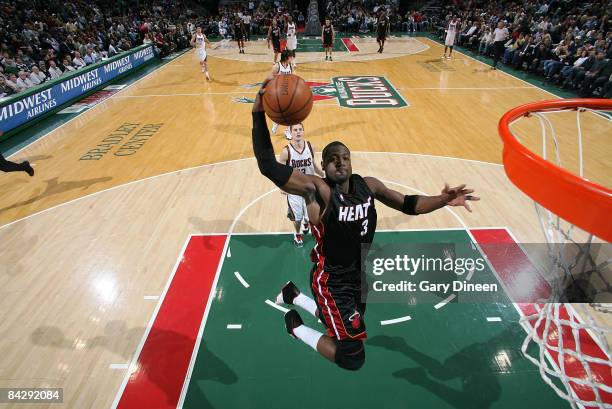 Dwyane Wade of the Miami Heat dunks against the Milwaukee Bucks on January 14, 2009 at the Bradley Center in Milwaukee, Wisconsin. NOTE TO USER: User...