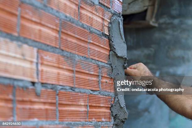 apply cement - mason stock pictures, royalty-free photos & images