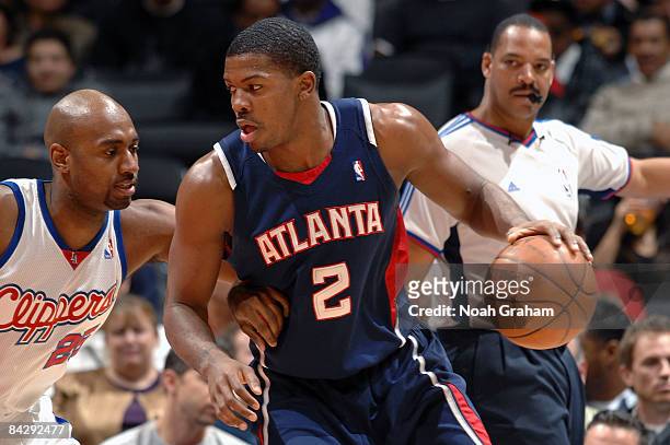 Joe Johnson of the Atlanta Hawks dribbles against Mardy Collins of the Los Angeles Clippers at Staples Center on January 14, 2009 in Los Angeles,...