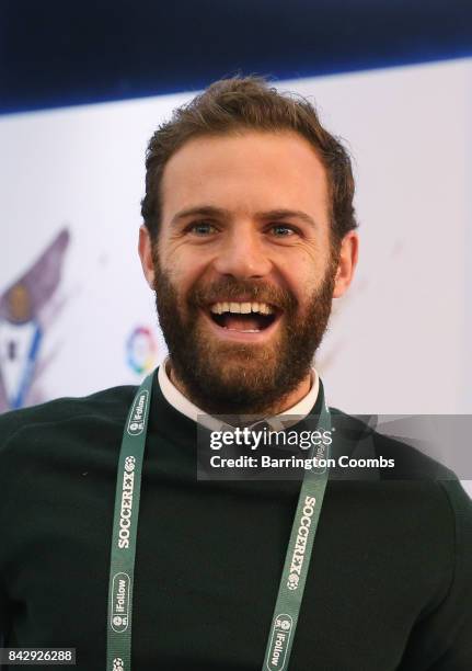 Juan Mata of Manchester United smiles in the La Liga lounge during day 2 of the Soccerex Global Convention at Manchester Central Convention Complex...