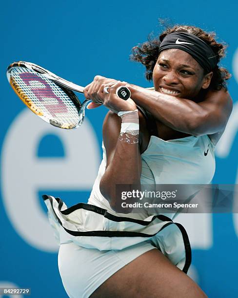 Serena Williams of the USA hits a backhand during her womens semi-final match against Elena Dementieva of Russia during day five of the 2009 Medibank...