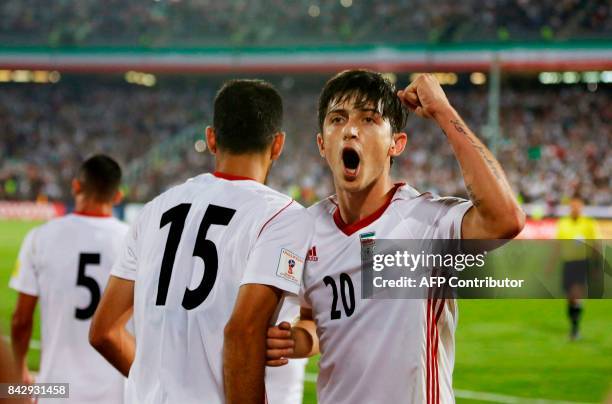 Sardar Azmoun of Iran celebrates after scoring a goal against Syria during the FIFA World Cup 2018 qualification football match between Iran and...