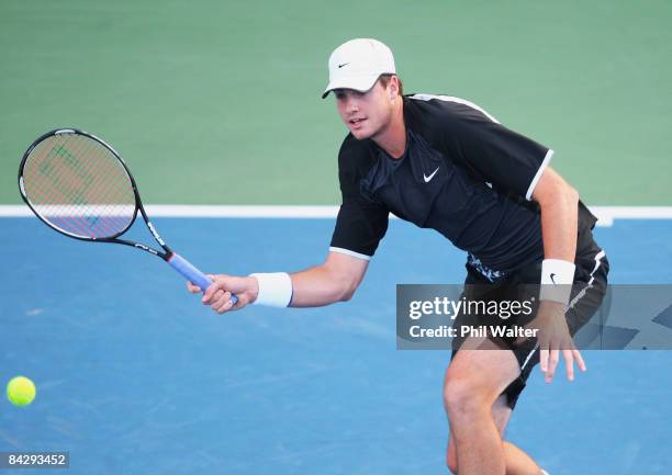 John Isner of the USA plays a forehand against Robin Soderling of Sweden during day four of the Heineken Open at ASB Tennis Centre on January 15,...