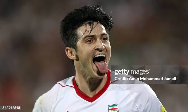 Sardar Azmoun of Iran celebrates after his first goal during FIFA 2018 World Cup Qualifier match between Iran v Syria on September 5, 2017 in Tehran,...