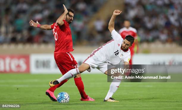 Alireza Jahanbakhsh of Iran and Zaher Almedani of Syria in action during FIFA 2018 World Cup Qualifier match between Iran v Syria on September 5,...