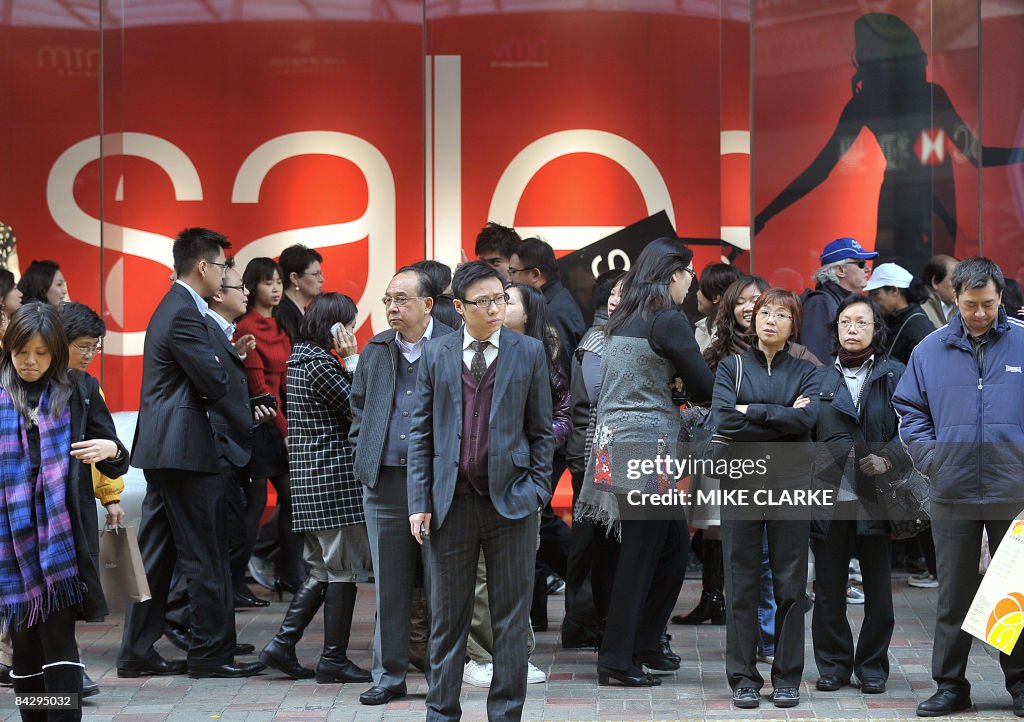 People wait for a traffic light to chang