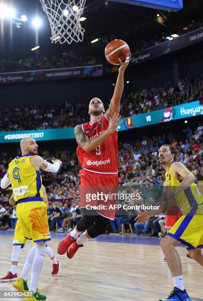 David Vojvoda of Hungary breaks through the Romanian defence during a Group C basketball match at the FIBA Eurobasket 2017 in Cluj Napoca, Romania...