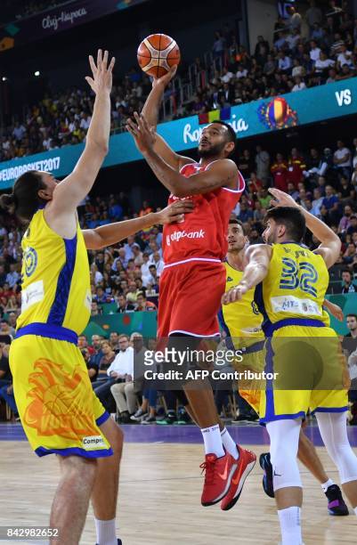Andrei Mandache of Romania vies with Adam Hanga of Hungary during a Group C basketball match at the FIBA Eurobasket 2017 in Cluj Napoca, Romania...
