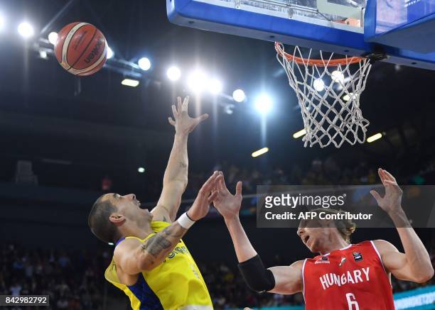 Andrei Mandache of Romania vies with Akos Keller of Hungary during a Group C basketball match at the FIBA Eurobasket 2017 in Cluj Napoca, Romania...