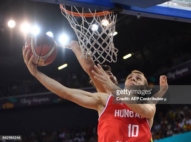 Nandor Kuti of Romania vies with Peter Kovacs of Hungary during a Group C basketball match at the FIBA Eurobasket 2017 in Cluj Napoca, Romania...