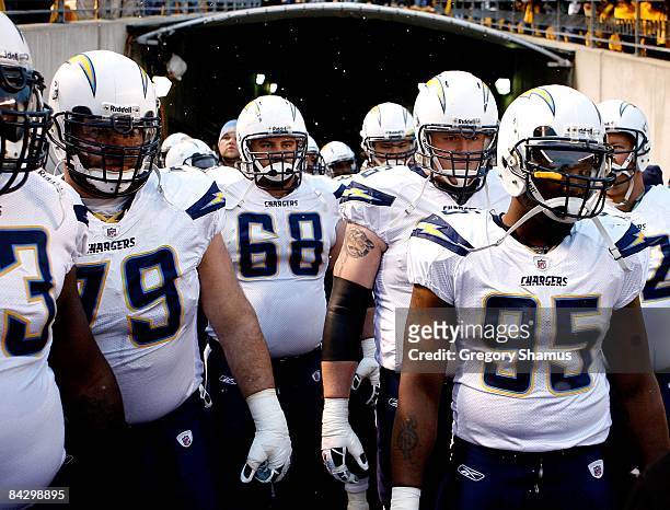 Mike Goff, Kris Dielman, Jeromey Clary and Shaun Phillips of the San Diego Chargers wait in the tunnel before taking the field against the Pittsburgh...