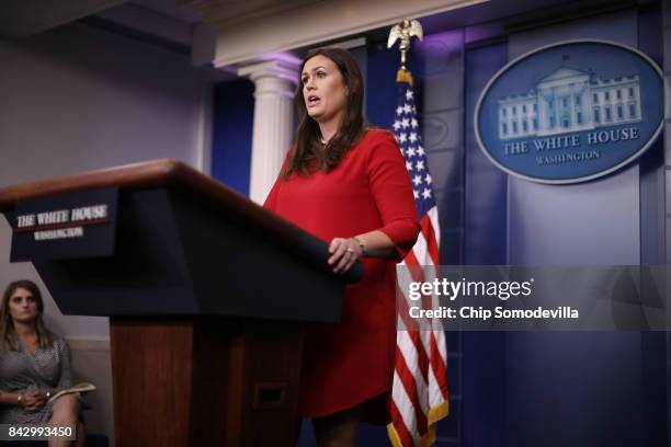 White House Press Secretary Sarah Huckabee Sanders calls on reporters during the daily news conference in the Brady Press Briefing Room at the White...