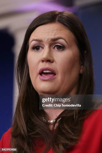 White House Press Secretary Sarah Huckabee Sanders calls on reporters during the daily news conference in the Brady Press Briefing Room at the White...