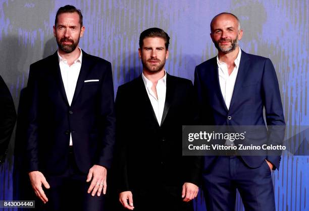 Jean-François Hensgens, Kevin Janssens and Jacques-Henri Bronckart walk the red carpet ahead of the 'Above The Law ' screening during the 74th Venice...