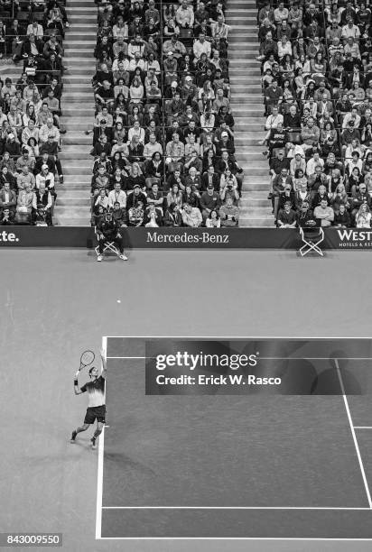 Wide view of Switzerland Roger Federer in action, serve vs Spain Feliciano Lopez during Men's 3rd Round match at BJK National Tennis Center....