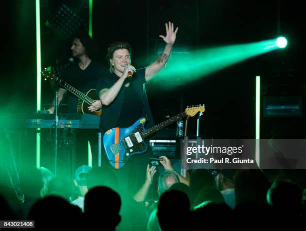 John Rzeznick of the Goo Goo Dolls performs on stage at Chastain Park Amphitheater on September 4, 2017 in Atlanta, Georgia.