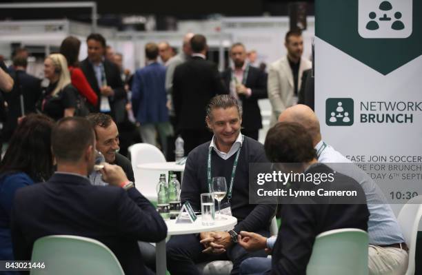 Delegates talk during Happy Hour on day 2 of the Soccerex Global Convention at Manchester Central Convention Complex on September 5, 2017 in...