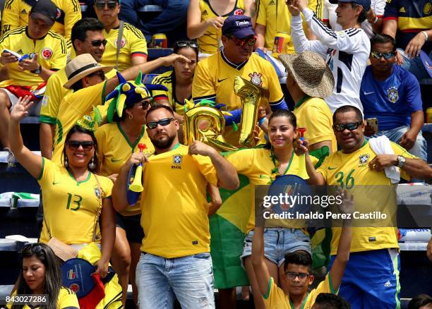 Fans of Brazil cheer for their team prior a match between Colombia and Brazil as part of FIFA 2018 World Cup Qualifiers at Metropolitano Roberto...