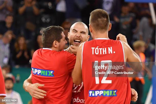 Hungarian players celebrate victory against Romania in the Group C basketball match of the FIBA Eurobasket 2017 between Romania and Hungary in Cluj...