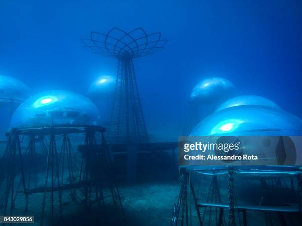 Biospheres are seen underwater anchored to the sea bottom between three and nine metres below the surface on August 2 2017. Nemo's Garden is a...