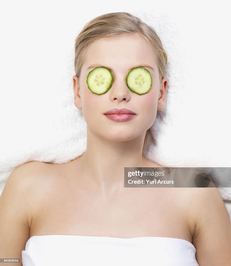 Young woman lying down in massage table