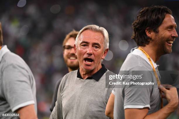 Head coach Bert van Marwijk of Saudi Arabia celebrates his side's 1-0 victory and qualified for the FIFA World Cup Russia after the FIFA World Cup...