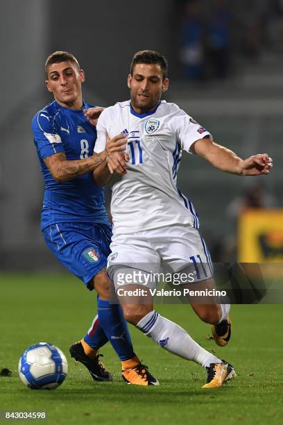 Marco Verratti of Italy is tackled and fouled by Etey Shechte of Israel during the FIFA 2018 World Cup Qualifier between Italy and Israel at Mapei...