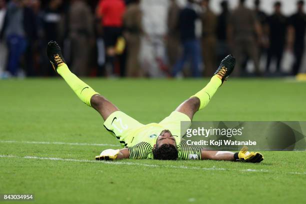 Abdullah Almayouf of Saudi Arabia celebrates his side's 1-0 victory and qualified for the FIFA World Cup Russia after the FIFA World Cup qualifier...