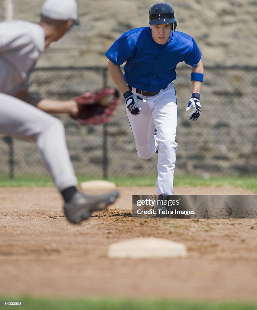 Baseball player trying to steal base