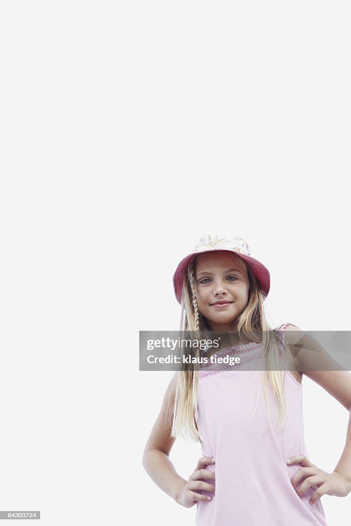 Girl posing with hands on hips