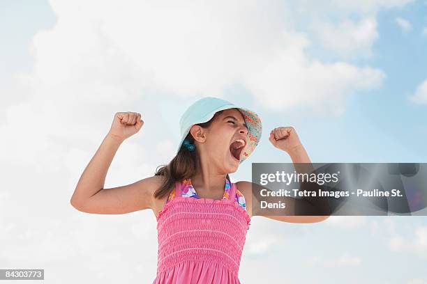 girl at beach making funny face - buff headwear stock pictures, royalty-free photos & images