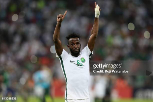 Fahad Al Muwallad of Saudi Arabia applauds supporters after his side's 1-0 victory and qualified for the FIFA World Cup Russia after the FIFA World...