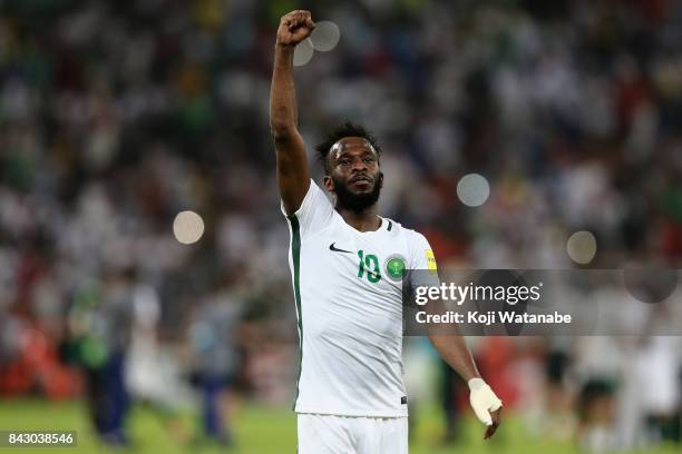 Fahad Al Muwallad of Saudi Arabia applauds supporters after his side's 1-0 victory and qualified for the FIFA World Cup Russia after the FIFA World...