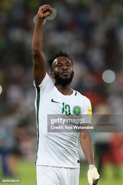 Fahad Al Muwallad of Saudi Arabia applauds supporters after his side's 1-0 victory and qualified for the FIFA World Cup Russia after the FIFA World...