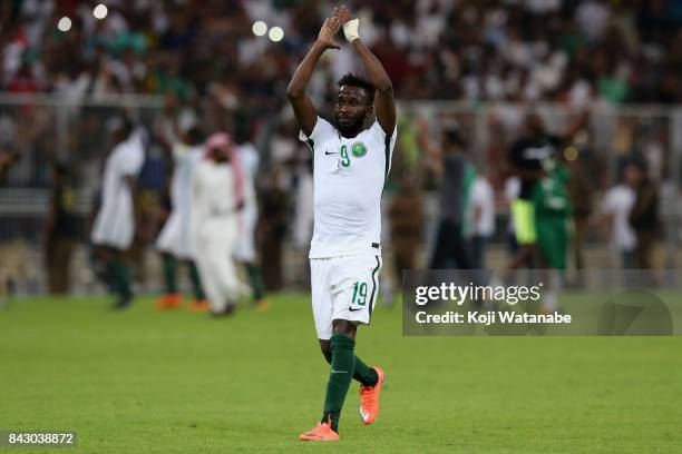 Fahad Al Muwallad of Saudi Arabia applauds supporters after his side's 1-0 victory and qualified for the FIFA World Cup Russia after the FIFA World...