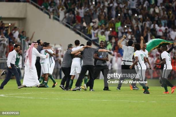 Saudi Arabia players celebrate their 1-0 victory and qualified for the FIFA World Cup Russia after the FIFA World Cup qualifier match between Saudi...