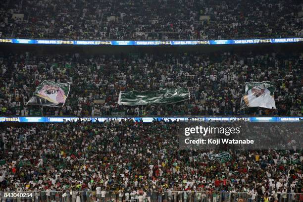 Saudi Arabia supporters celebrate their team's 1-0 victory and qualified for the FIFA World Cup Russia after the FIFA World Cup qualifier match...