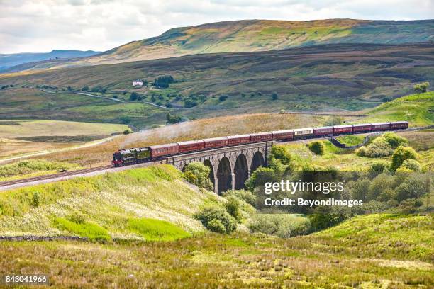 settle carlisle steam train tour in spectacular yorkshire dales scenery - yorkshire dales national park stock pictures, royalty-free photos & images