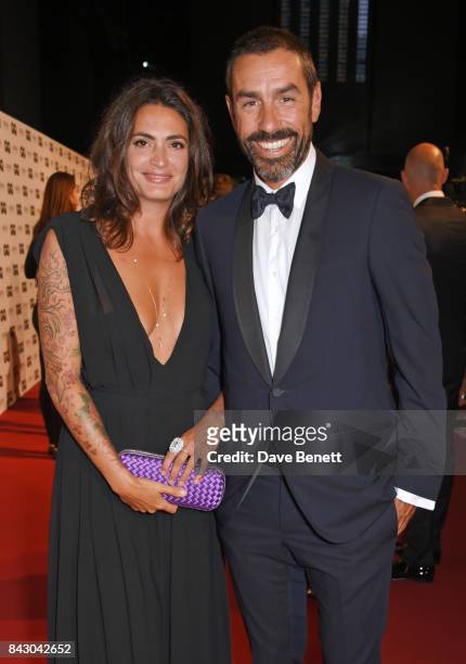 Jessica Lemarie and Robert Pires attend the GQ Men Of The Year Awards at the Tate Modern on September 5, 2017 in London, England.