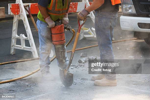 construction workers using jackhammer and shovel - broken sound stock pictures, royalty-free photos & images