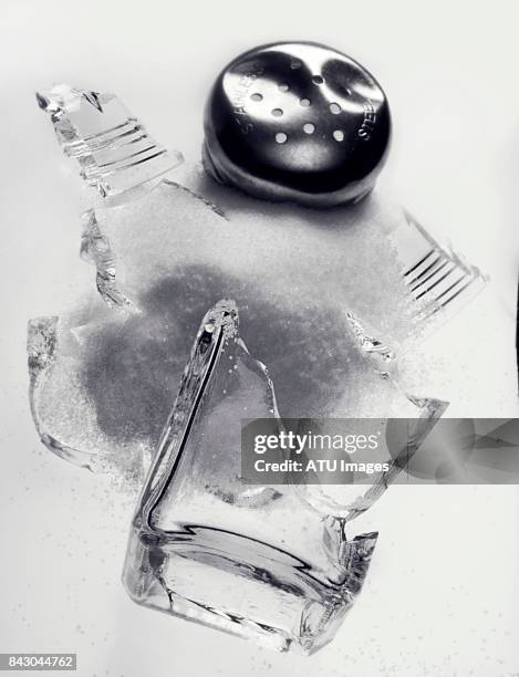 broken salt shaker - salt shaker stock pictures, royalty-free photos & images