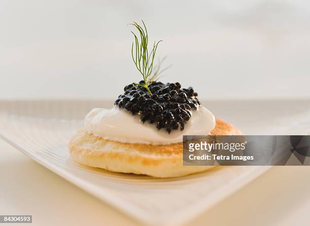 close up of caviar appetizer - kaviaar stockfoto's en -beelden