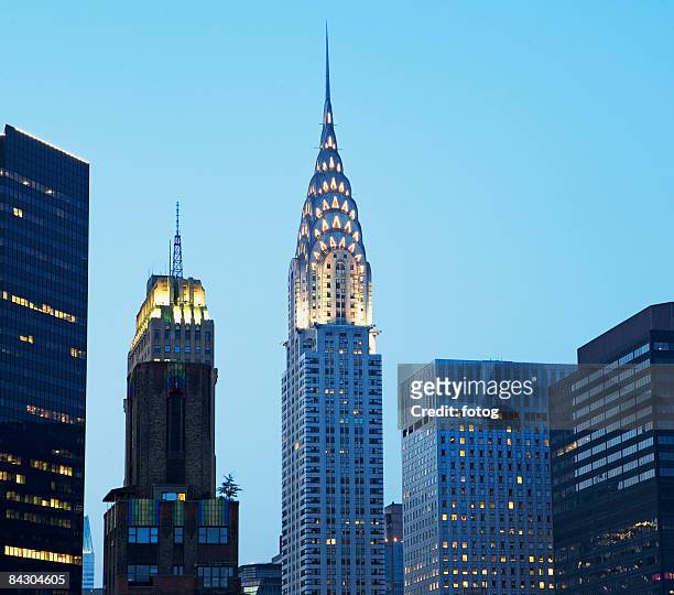 urban buildings at night - chrysler building stock pictures, royalty-free photos & images