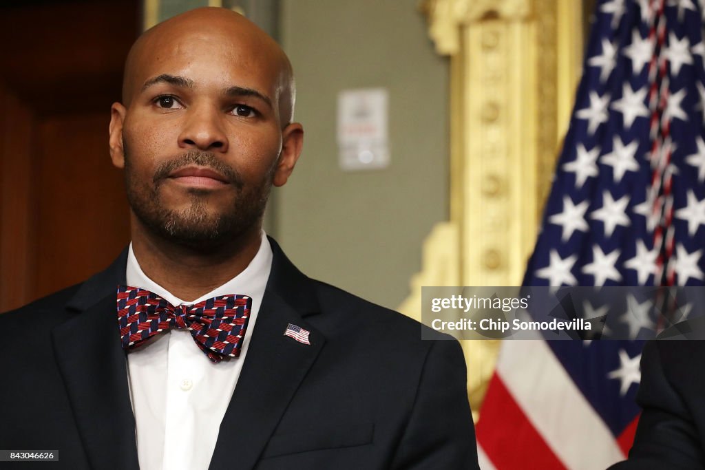 Vice President Pence Swears In New Surgeon General Dr. Jerome Adams